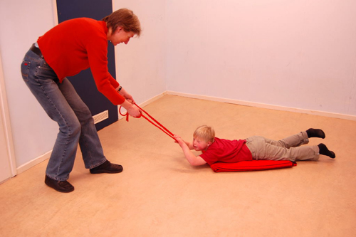 pulling your kid around on a blanket